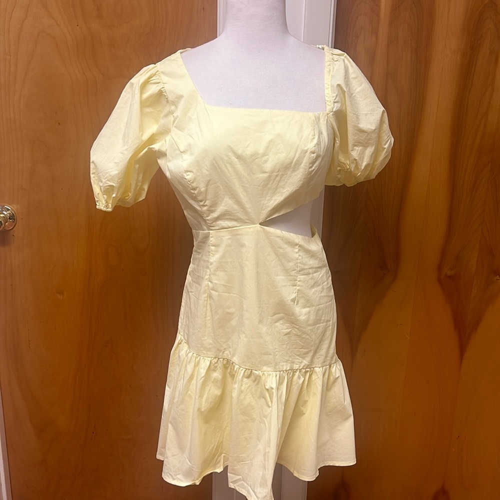 Astr yellow dress with side cut out size medium